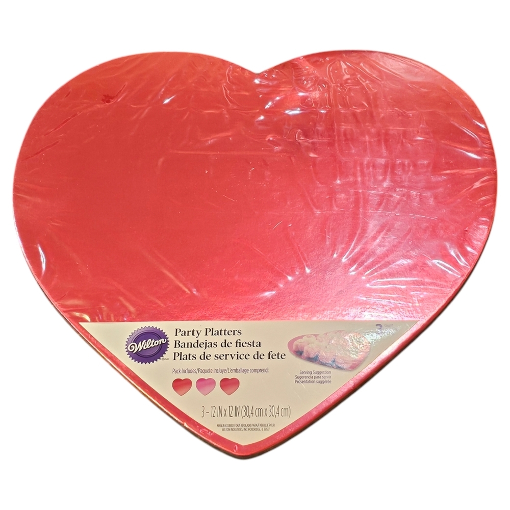 Elevate your celebrations with this set of 3 Wilton heart-shaped party platters